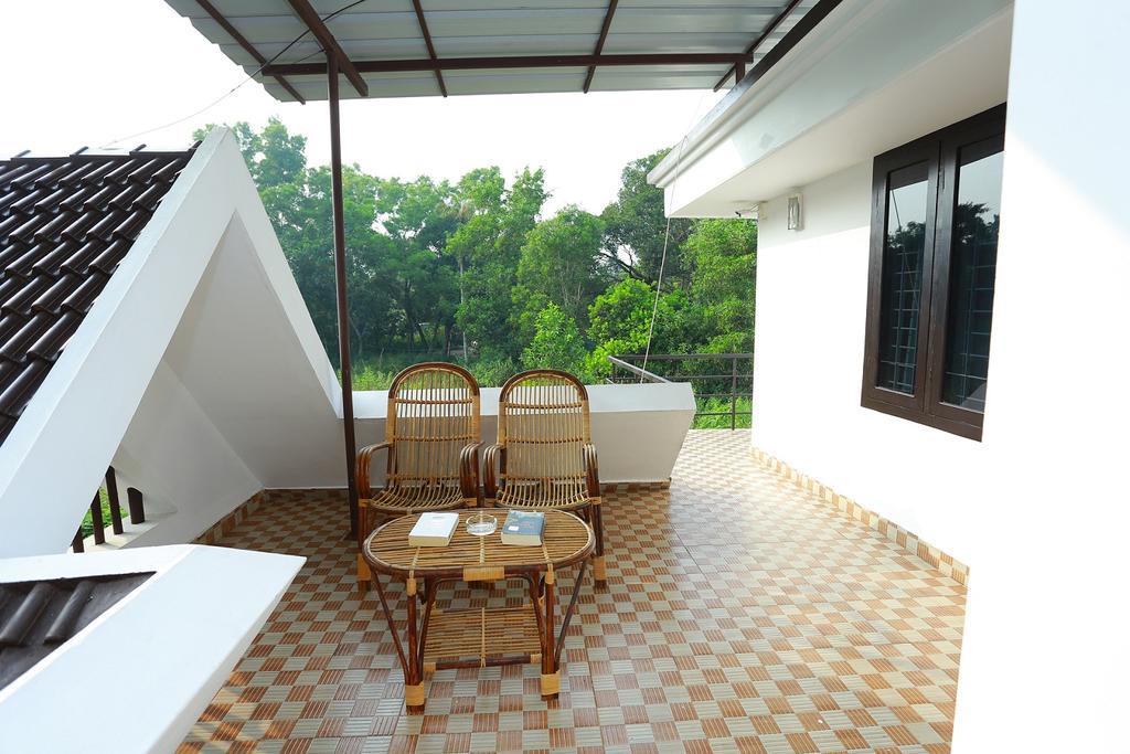 Alma Homestay Марарикулам Экстерьер фото
